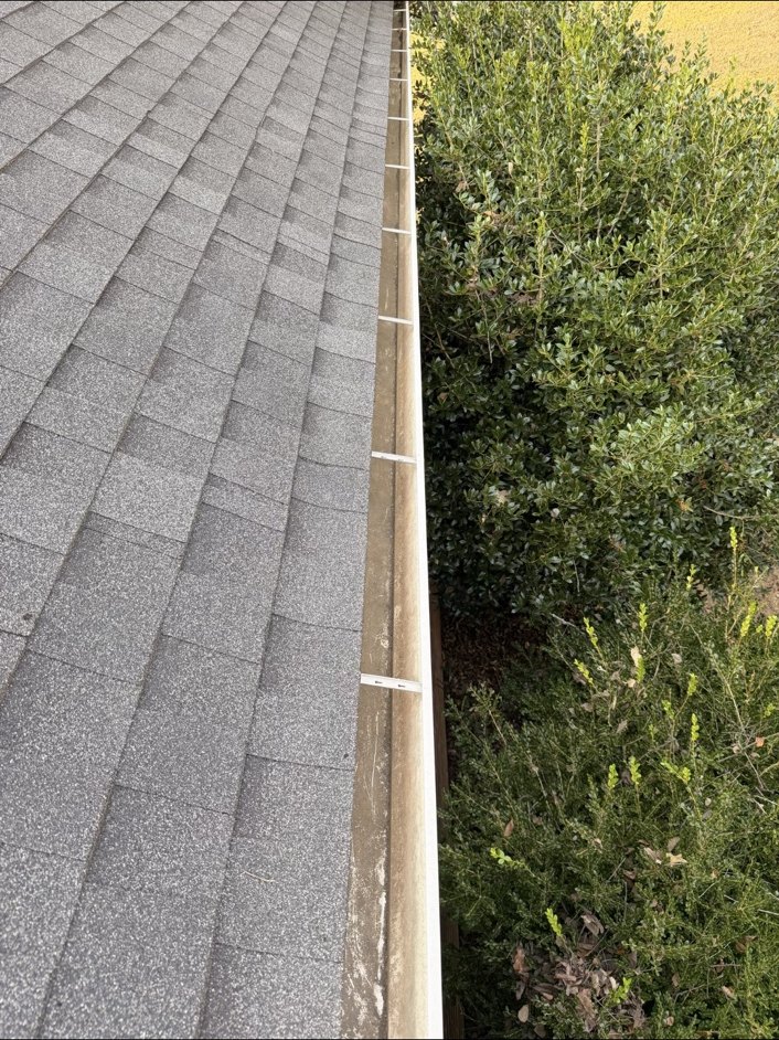 Gutter after leaves and debris were removed